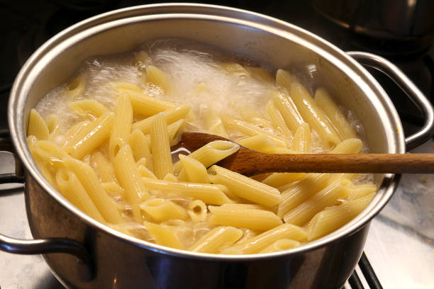 boil the pasta , i have used penne.