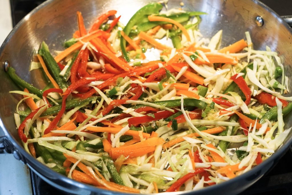 Stir fry the veggies in pan