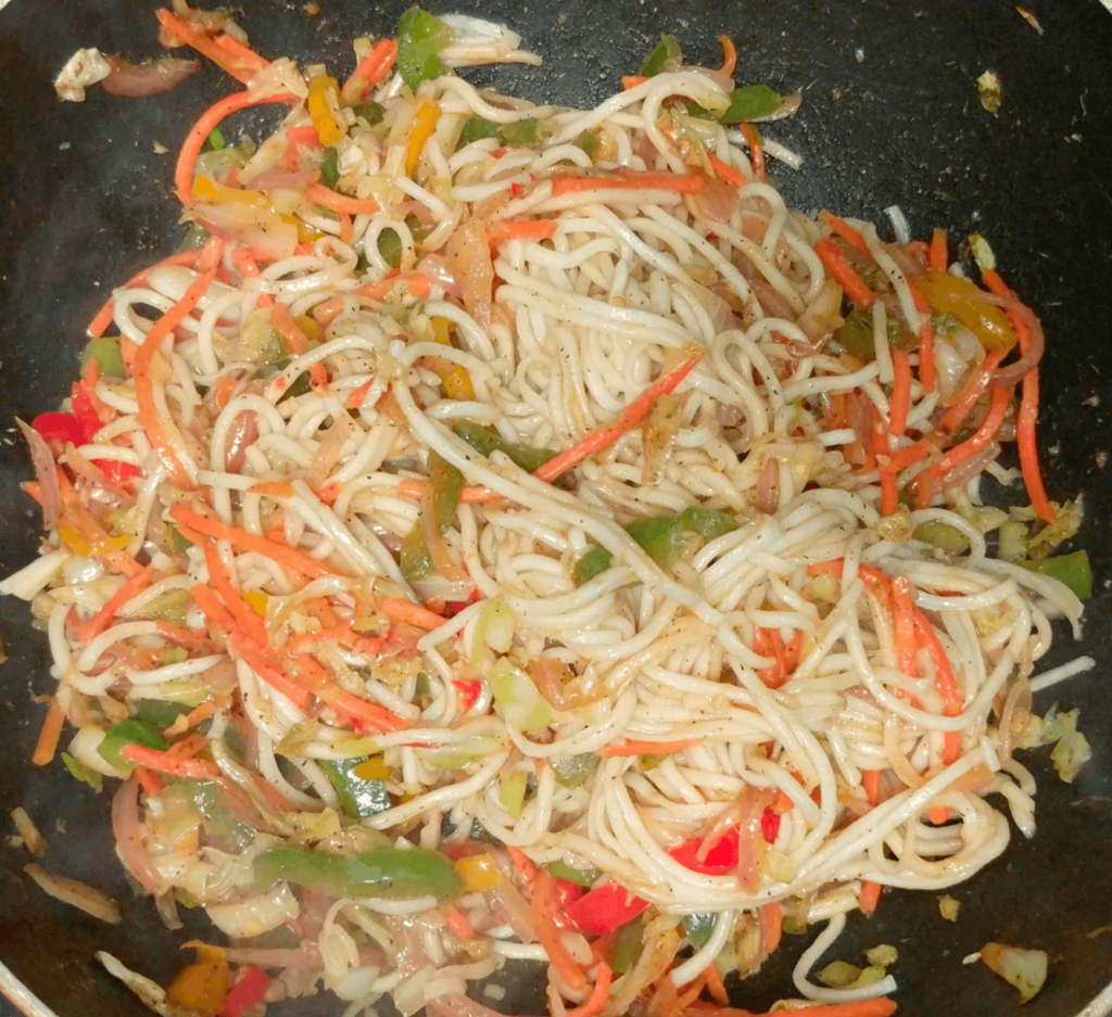 combine noodles with veggies